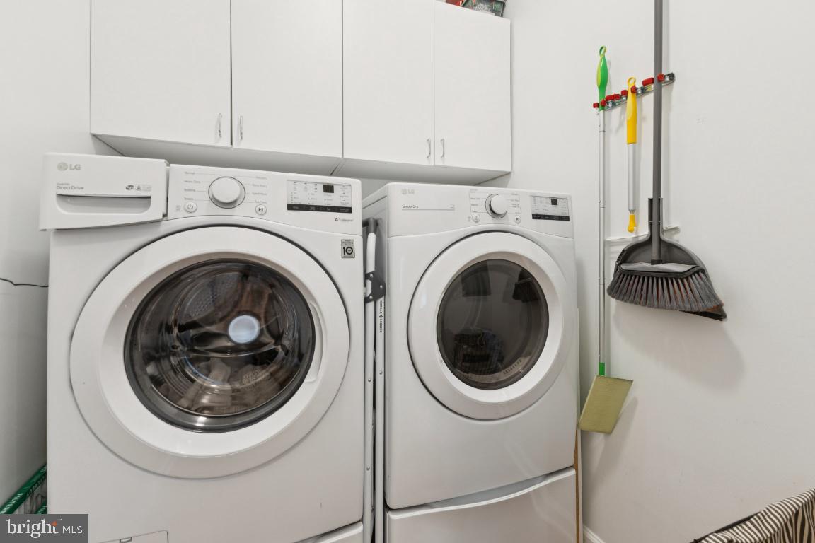 12000 Market Street, Unit 151 Reston, VA 20190 - Photo 15 of 58 Spacious Laundry Rm with modern washer & dryer