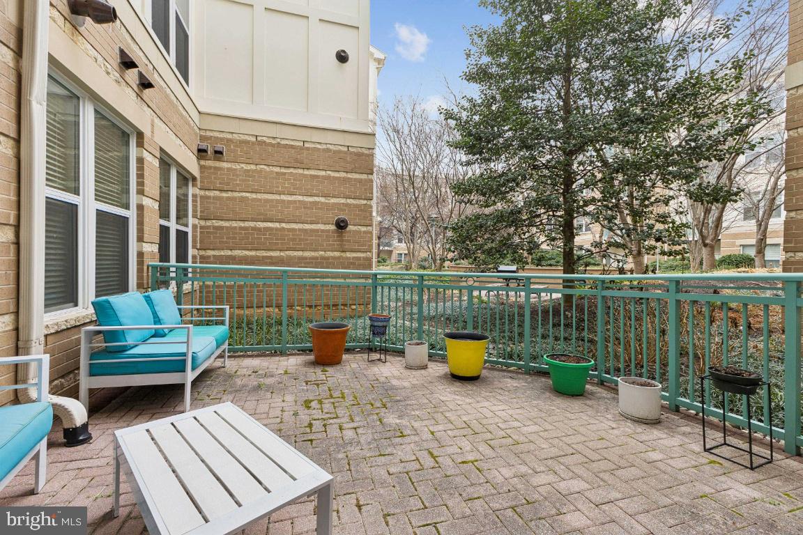 12000 Market Street, Unit 151 Reston, VA 20190 - Photo 26 of 58 Huge private balcony that backs to the courtyard