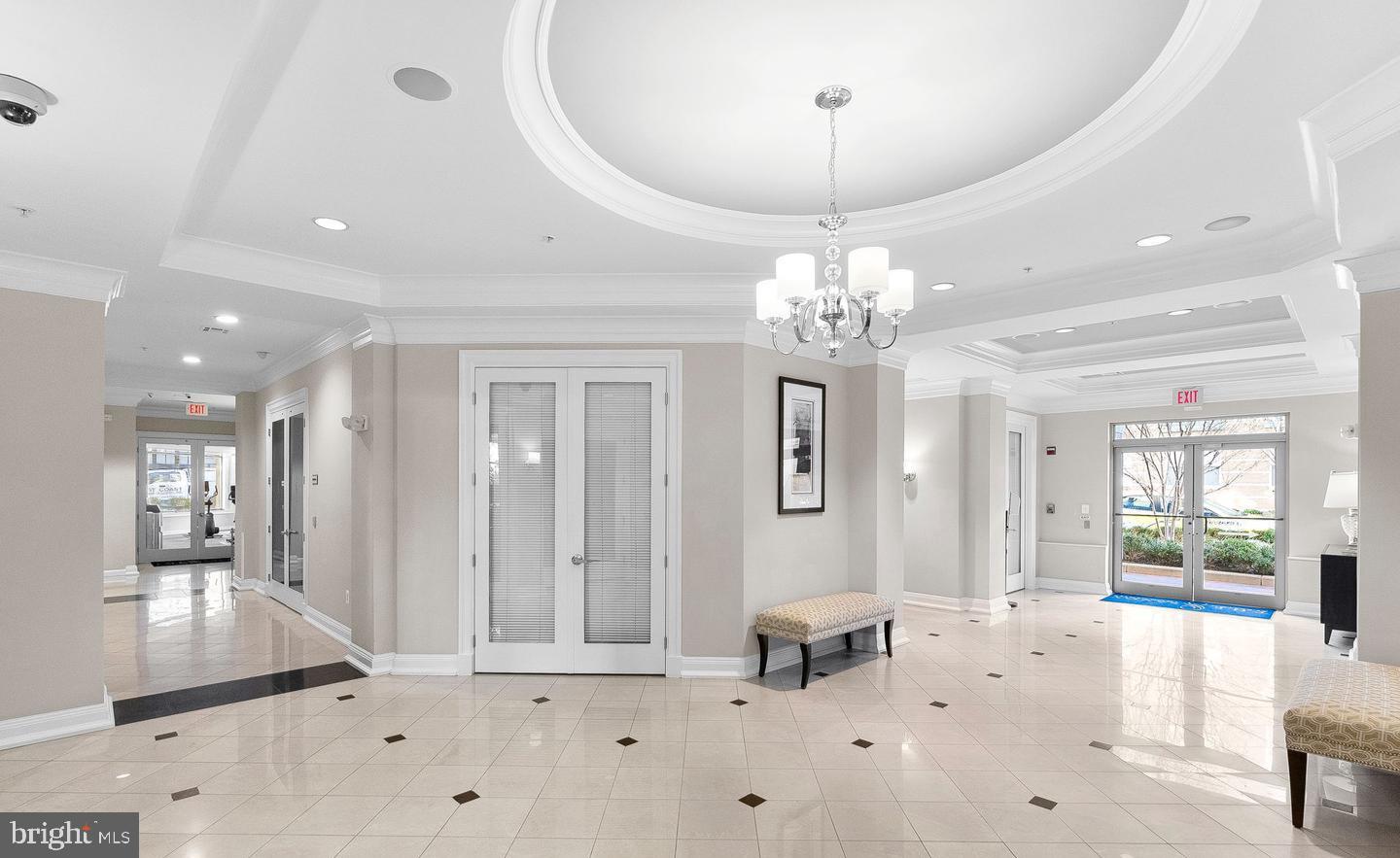 12000 Market Street, Unit 151 Reston, VA 20190 - Photo 36 of 58 Modern hallway with easy access to building exit.