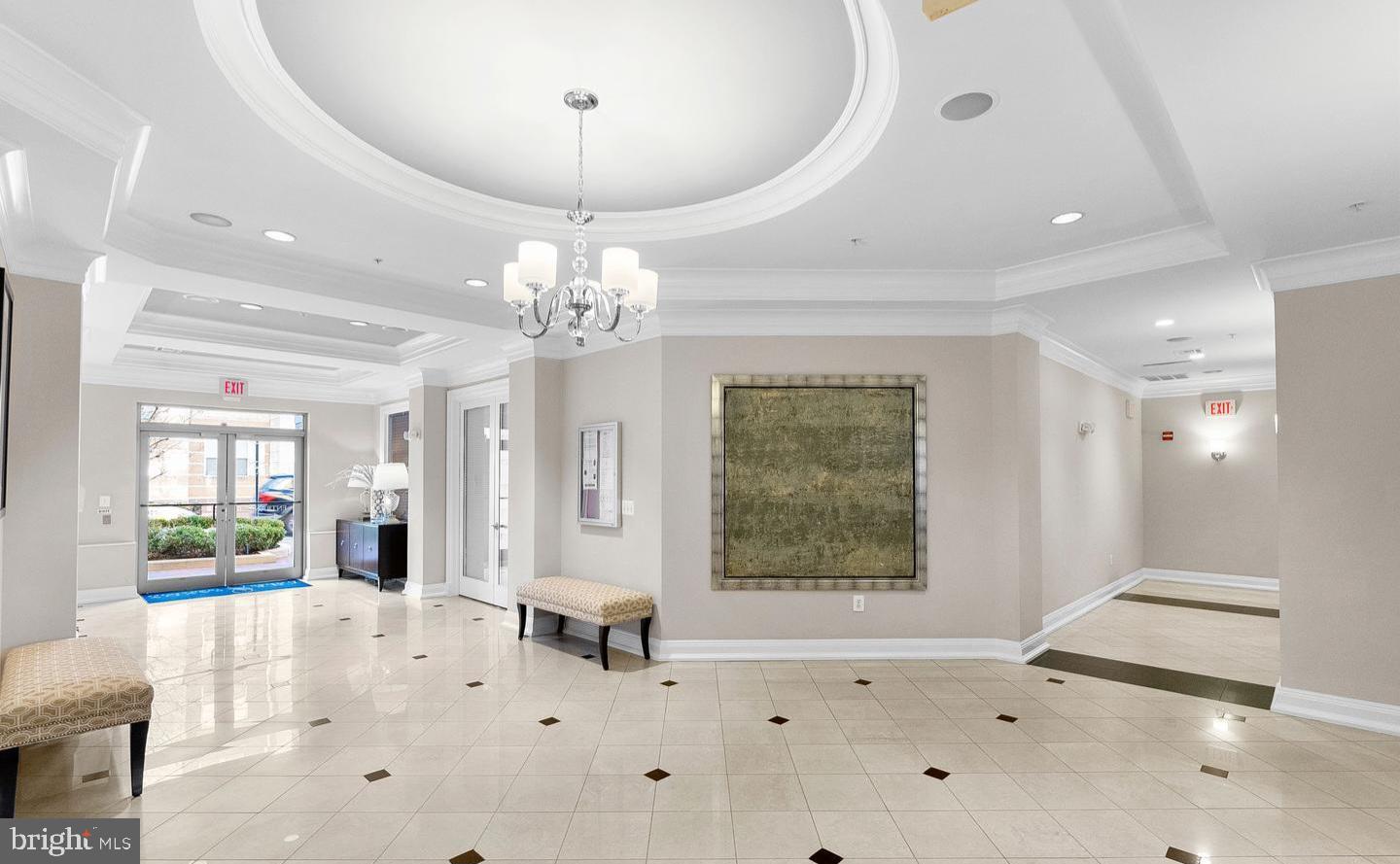 12000 Market Street, Unit 151 Reston, VA 20190 - Photo 37 of 58 Modern hallway with easy access to building exit.