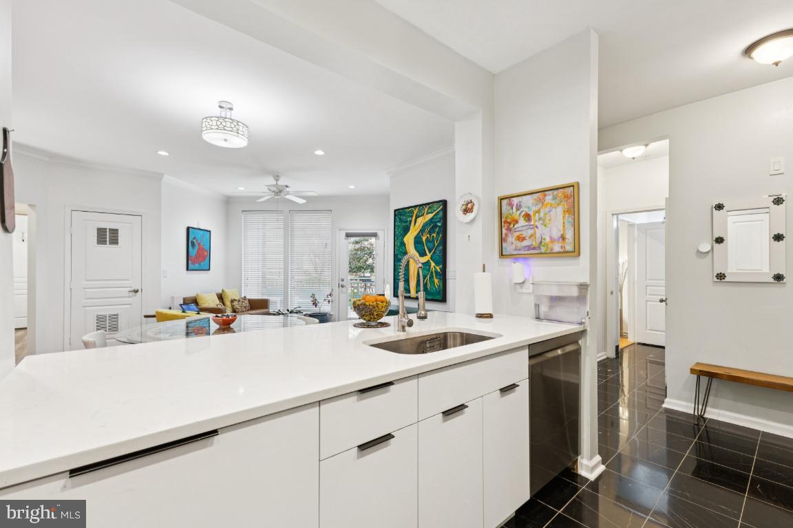 12000 Market Street, Unit 151 Reston, VA 20190 - Photo 8 of 58 Modern kitchen with plenty of cabinets and storage