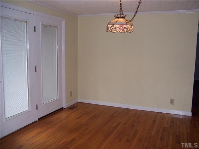 350 Wrenn Crumpton Road Roxboro, NC 27574 - Photo 3 of 12 Dining area has garden door to back deck