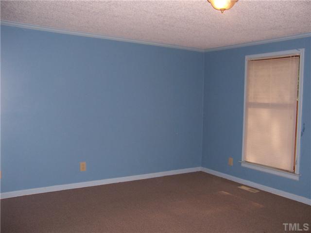 350 Wrenn Crumpton Road Roxboro, NC 27574 - Photo 6 of 12 One of the two bedrooms located on the main level