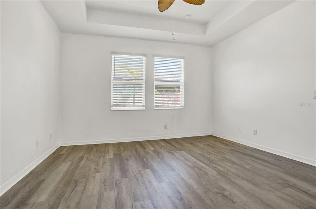 8544 Cache Drive Sarasota, FL 34240 - Photo 19 of 46 an empty room with a window