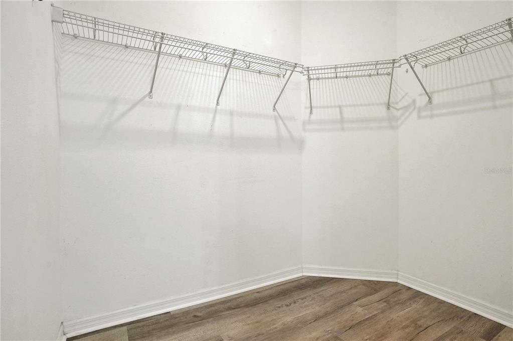 8544 Cache Drive Sarasota, FL 34240 - Photo 23 of 46 a view of a room with racks on the wall