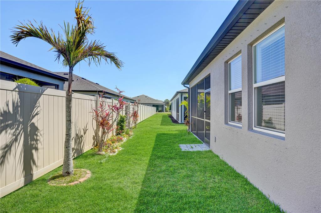 8544 Cache Drive Sarasota, FL 34240 - Photo 33 of 46 a view of a house with a yard