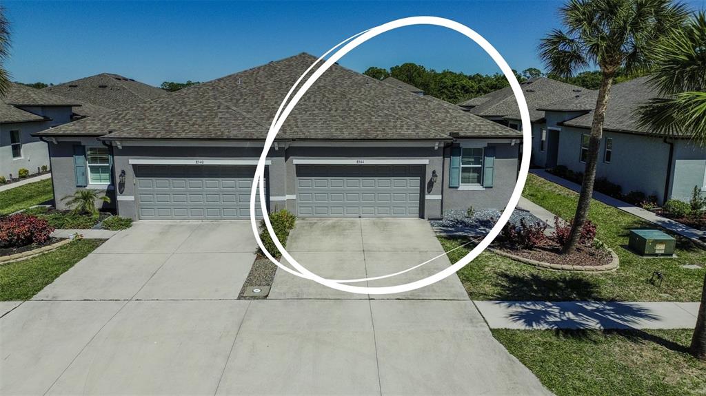 8544 Cache Drive Sarasota, FL 34240 - Photo 39 of 46 a house view with a sink and a potted plant