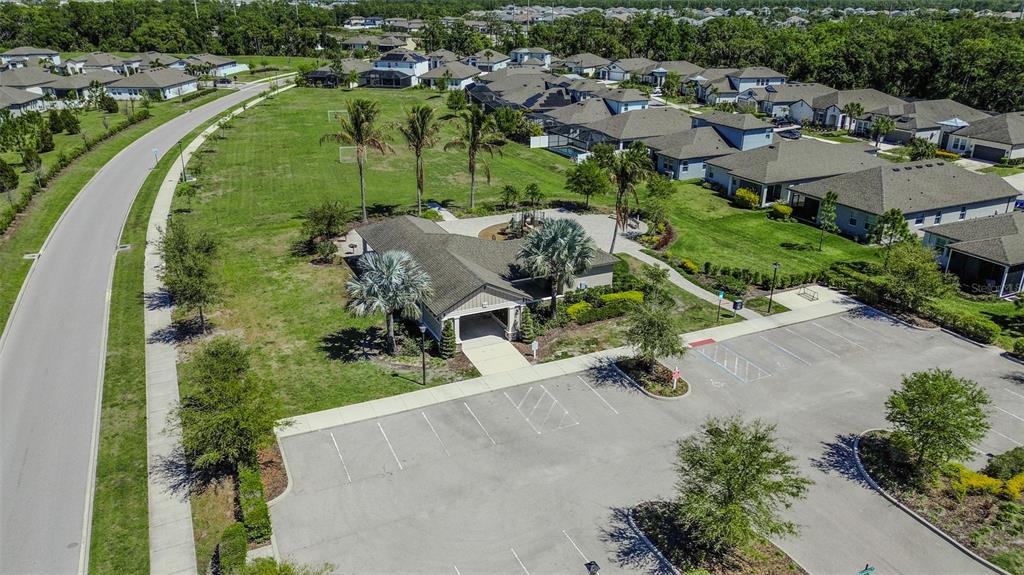 8544 Cache Drive Sarasota, FL 34240 - Photo 44 of 46 an aerial view of residential houses with outdoor space and parking