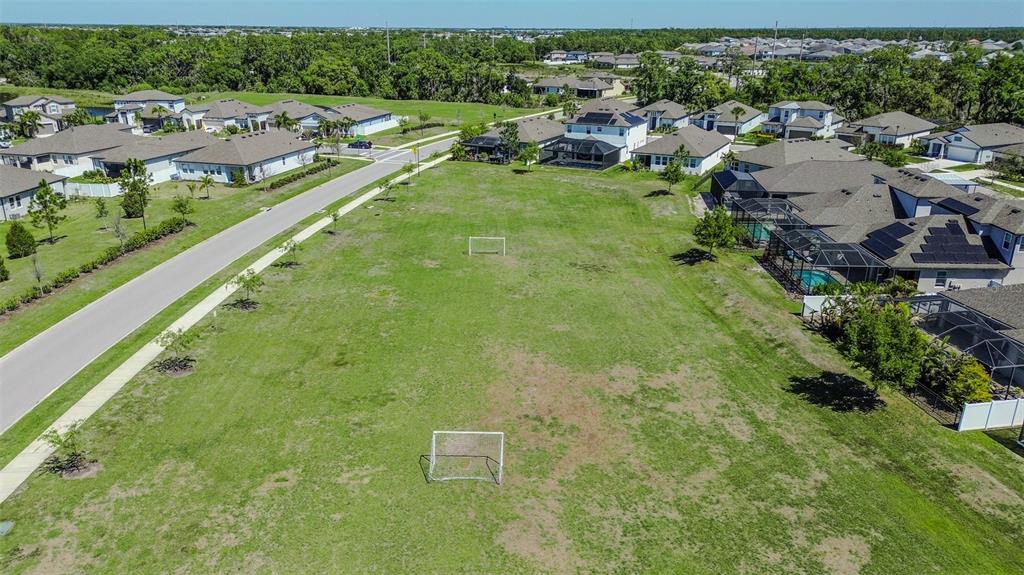 8544 Cache Drive Sarasota, FL 34240 - Photo 45 of 46 a view of a lake with a yard