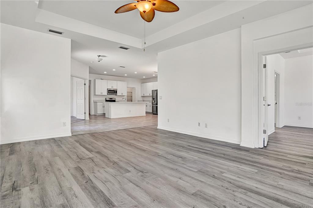 8544 Cache Drive Sarasota, FL 34240 - Photo 7 of 46 a view of a kitchen with wooden floor