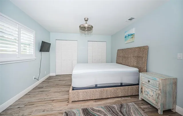 a bathroom with a sink a toilet and shower curtain