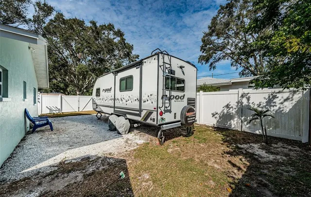 a house with trees in front of it