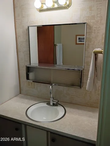 a bedroom with a bed and a closet