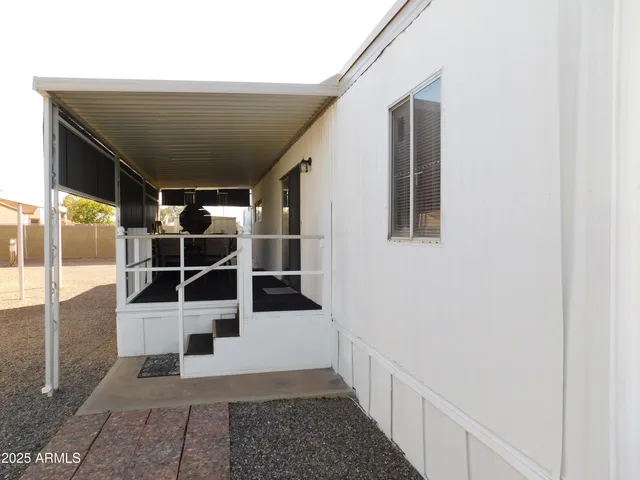 a workspace with furniture and a window