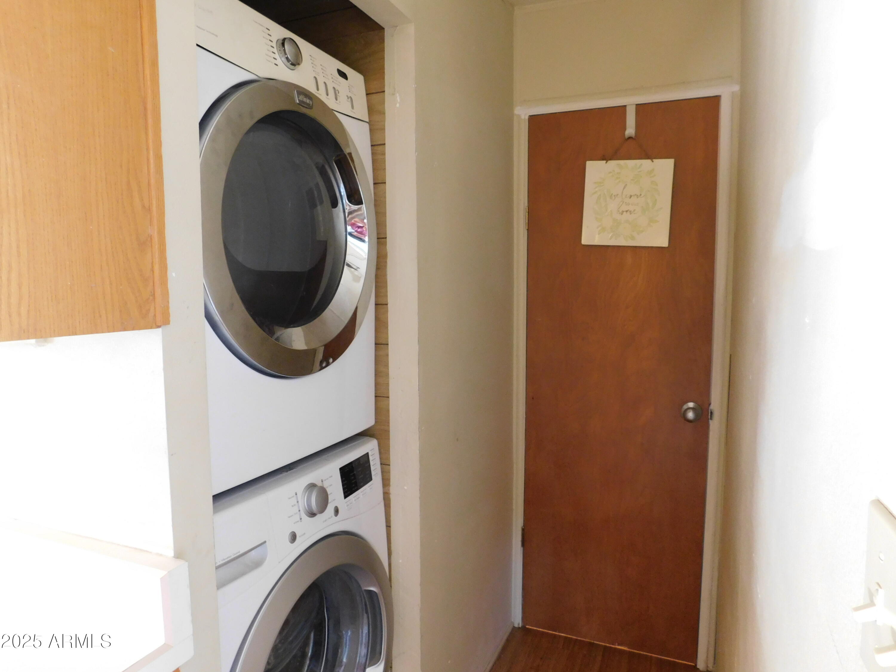 15802 South Gilbert Road, Unit 58 Chandler, AZ 85225 - Photo 9 of 21 a utility room with dryer and washer