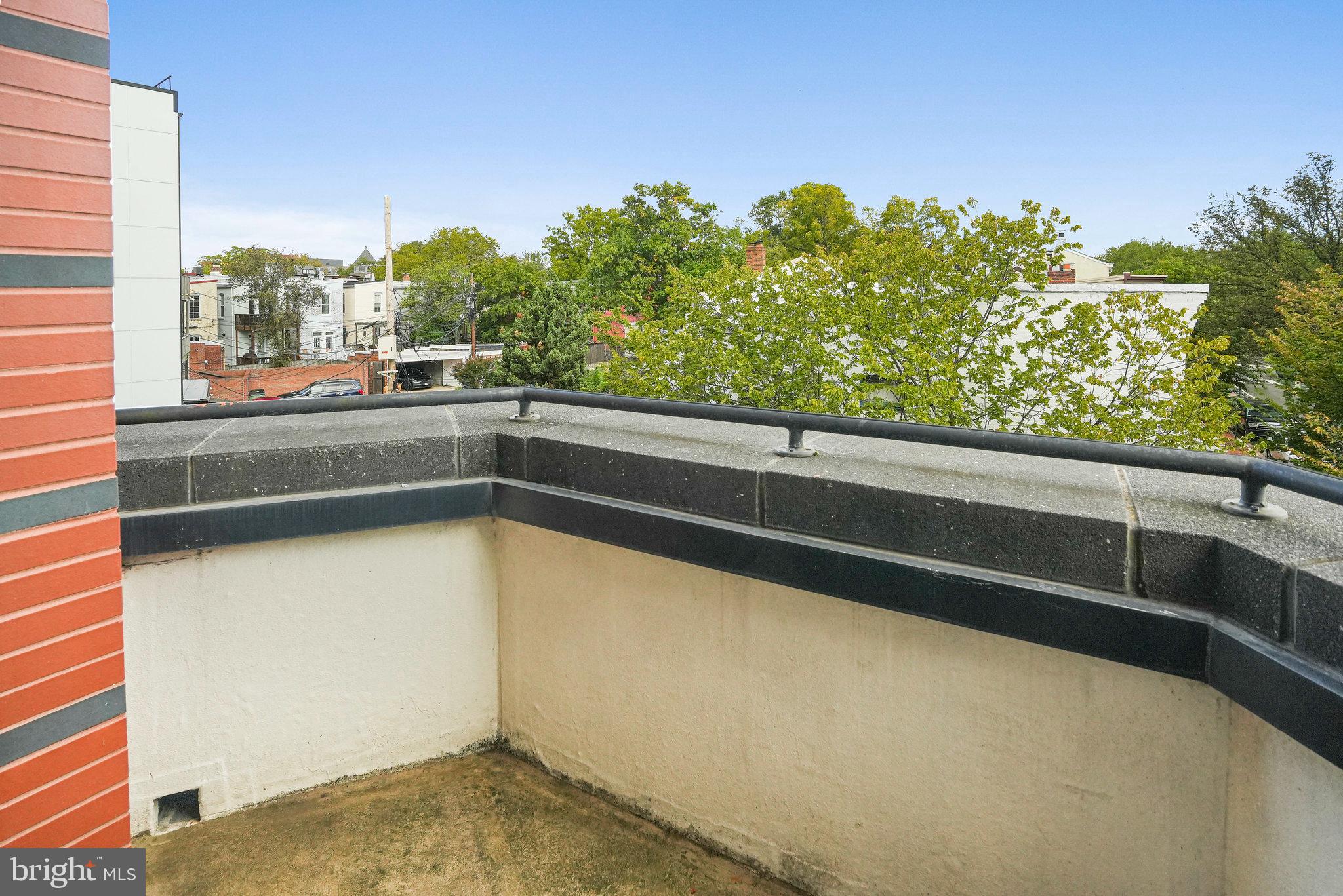 1020 Pennsylvania Ave. Southeast, Unit 404 Washington, DC 20003 - Photo 15 of 24 a view of balcony with yard
