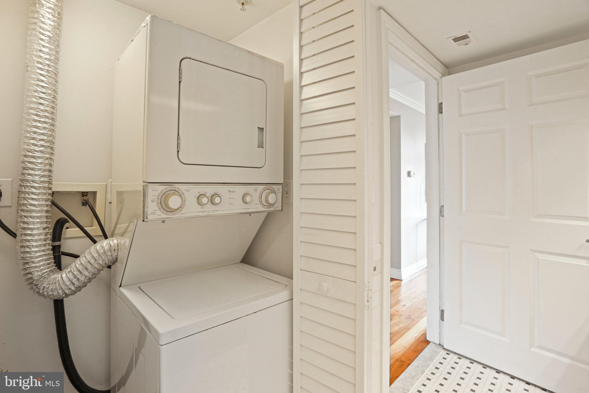 1020 Pennsylvania Ave. Southeast, Unit 404 Washington, DC 20003 - Photo 20 of 24 a view of washer and dryer