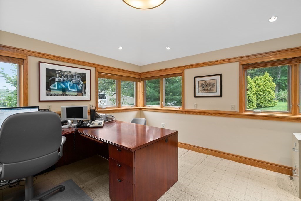 130 Farm Street Dover, MA 02030 - Photo 14 of 39 a workspace with furniture and a window