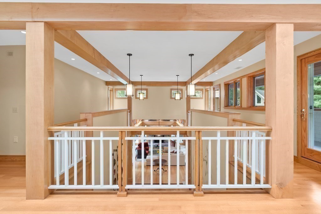 130 Farm Street Dover, MA 02030 - Photo 15 of 39 a view of a building from a porch