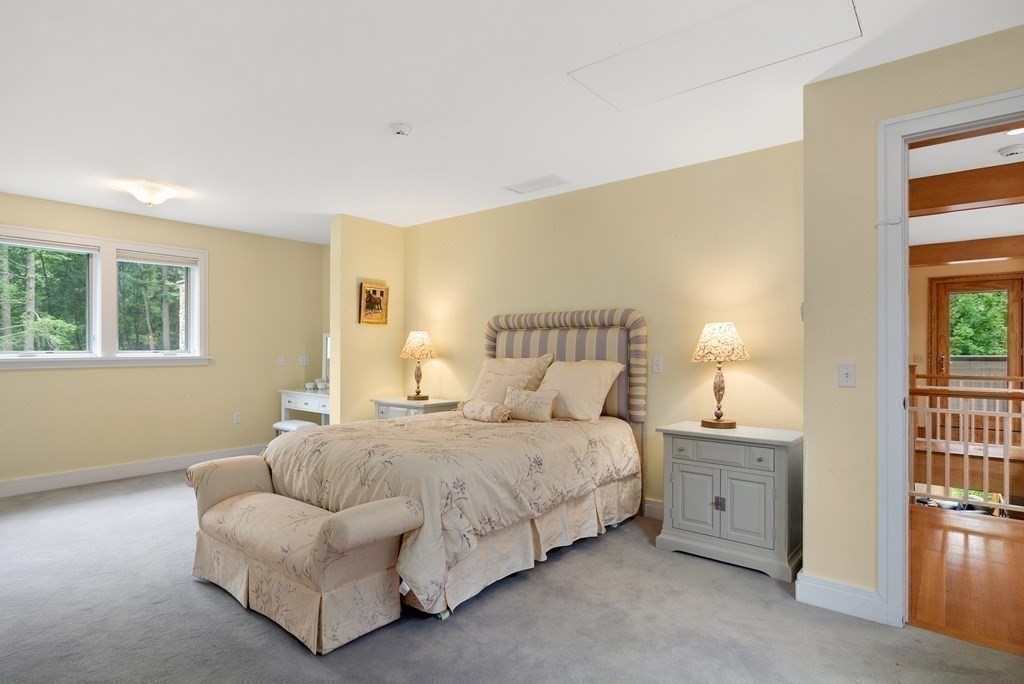 130 Farm Street Dover, MA 02030 - Photo 16 of 39 a bedroom with a bed and a window