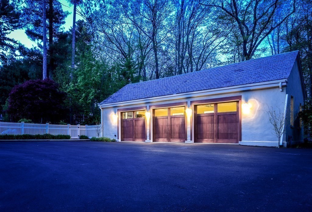 130 Farm Street Dover, MA 02030 - Photo 25 of 39 a backyard of a house with table and chairs