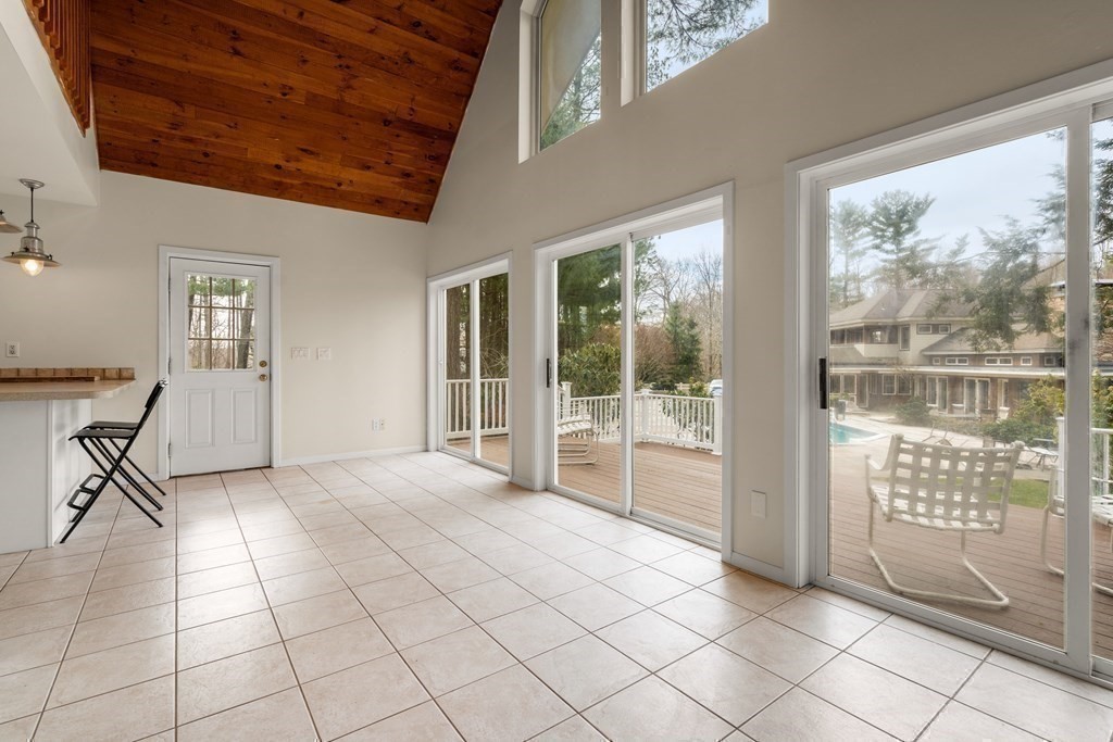 130 Farm Street Dover, MA 02030 - Photo 30 of 39 a view of empty room with wooden floor and fan