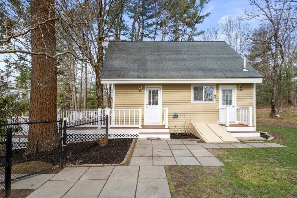 130 Farm Street Dover, MA 02030 - Photo 36 of 39 a view of a house with a patio