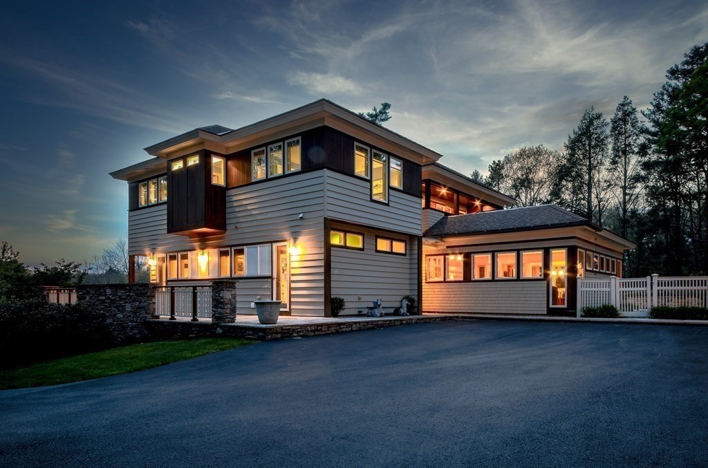 130 Farm Street Dover, MA 02030 - Photo 37 of 39 a front view of a house with a yard
