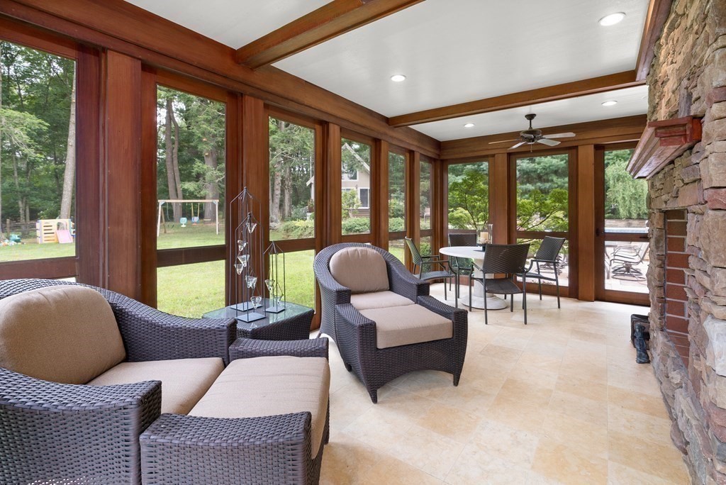 130 Farm Street Dover, MA 02030 - Photo 9 of 39 a living room with furniture and large windows