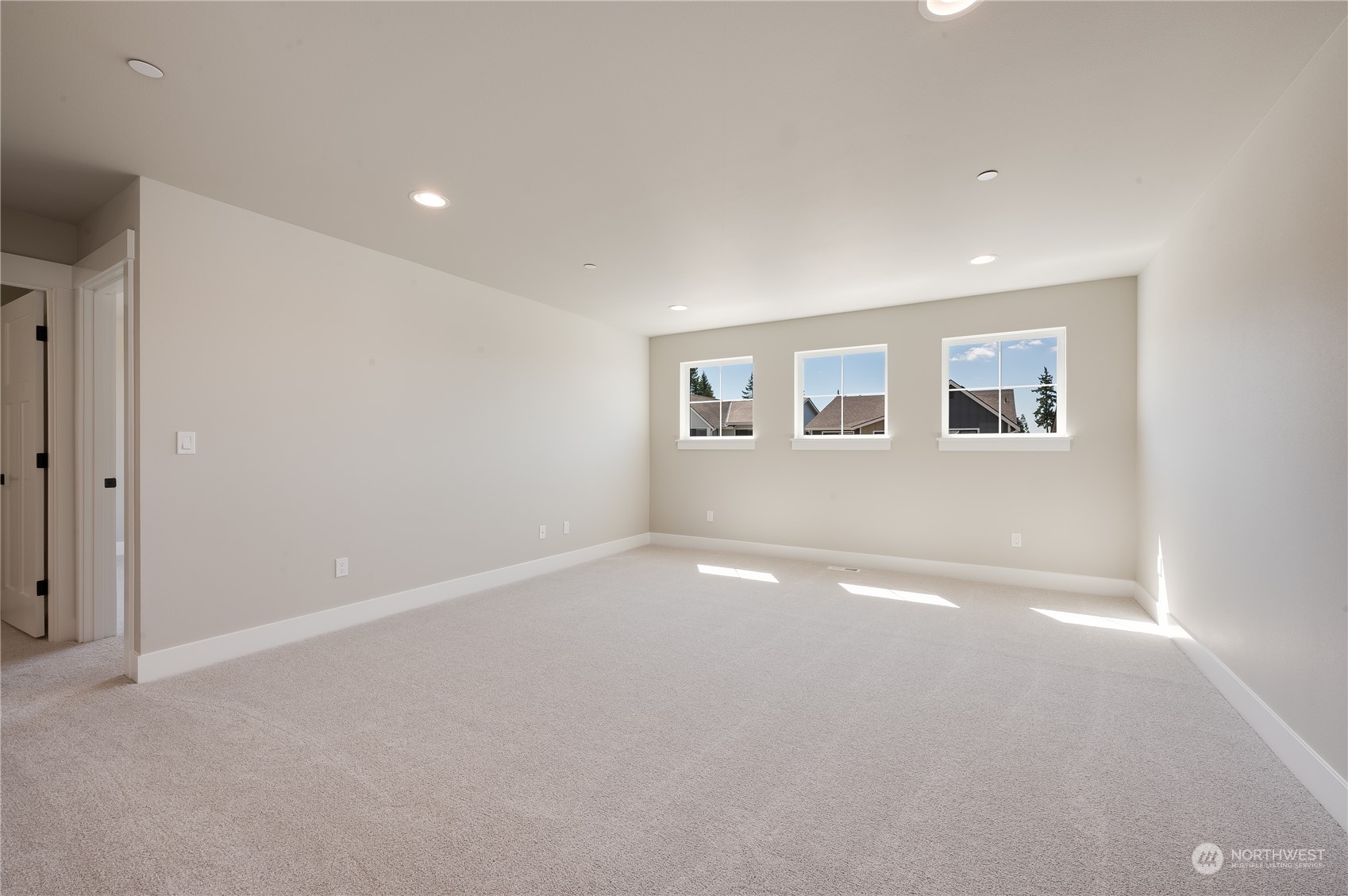 4433 244th Street Southeast, Unit LOT02 Bothell, WA 98021 - Photo 21 of 40 a view of empty room with windows