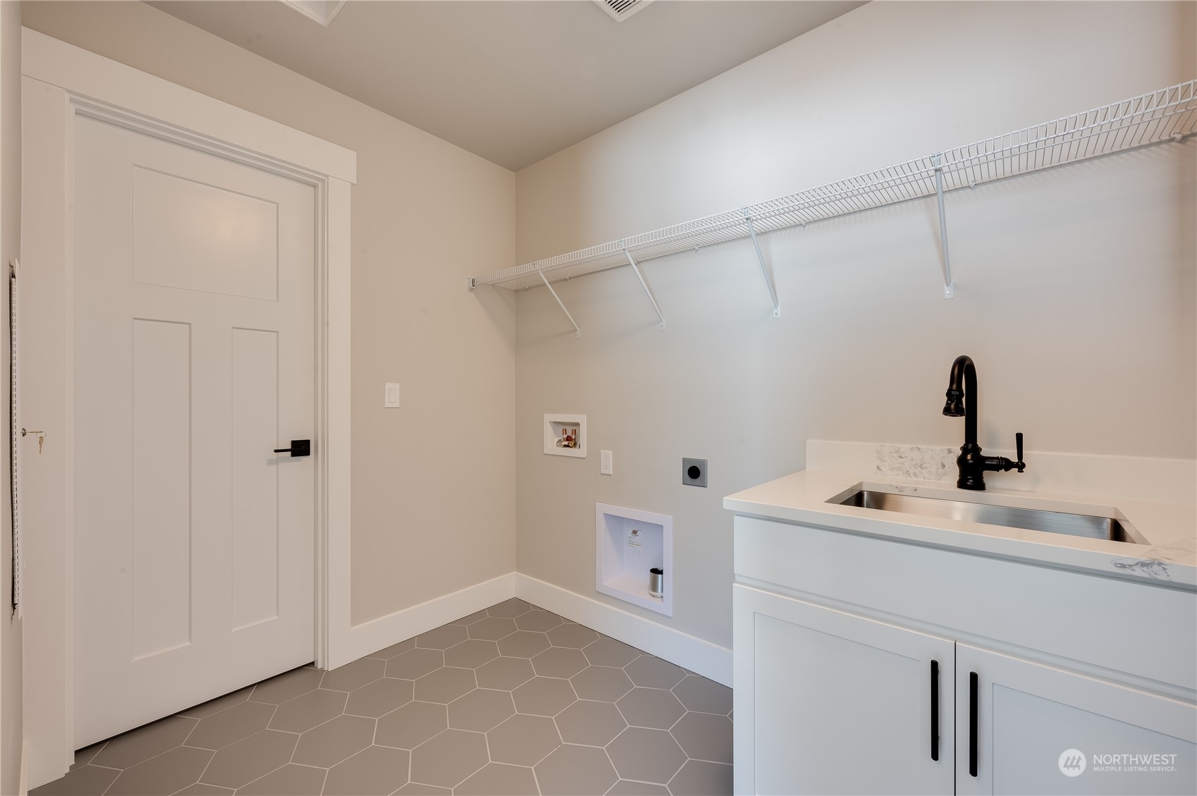 4433 244th Street Southeast, Unit LOT02 Bothell, WA 98021 - Photo 27 of 40 a bathroom with a sink and mirror