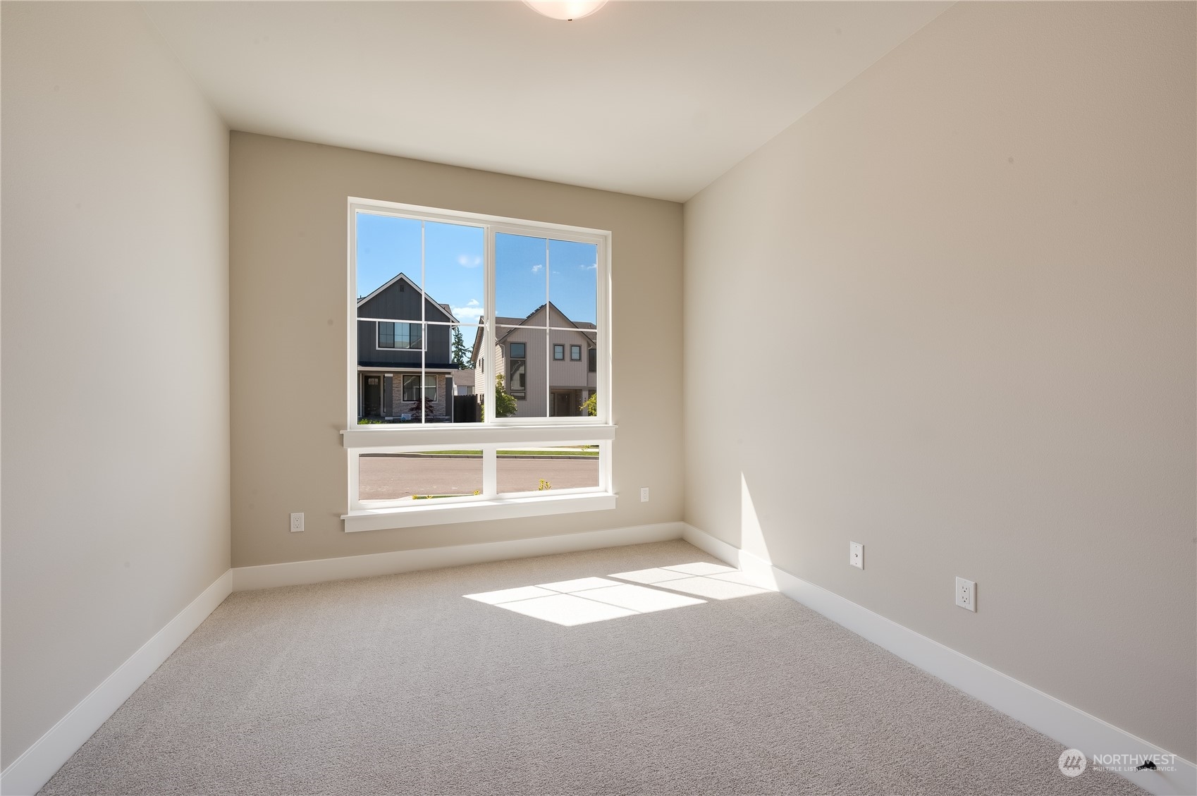 4433 244th Street Southeast, Unit LOT02 Bothell, WA 98021 - Photo 4 of 40 a view of empty room with a window