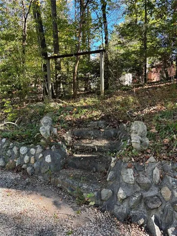 a view of a tree in front of a house