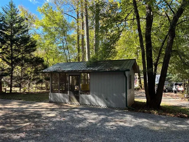 a backyard of a house with lots of green space