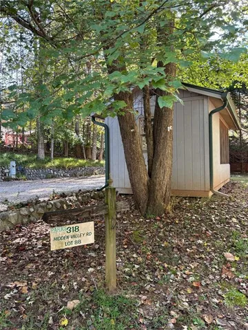 a house with trees in the background