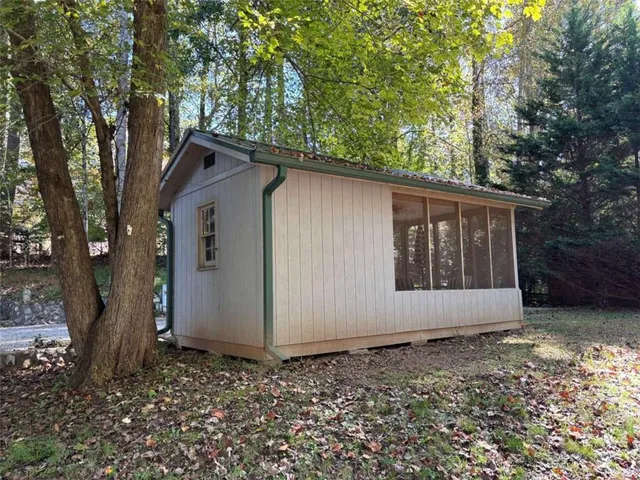 a view of a yard with an outdoor space
