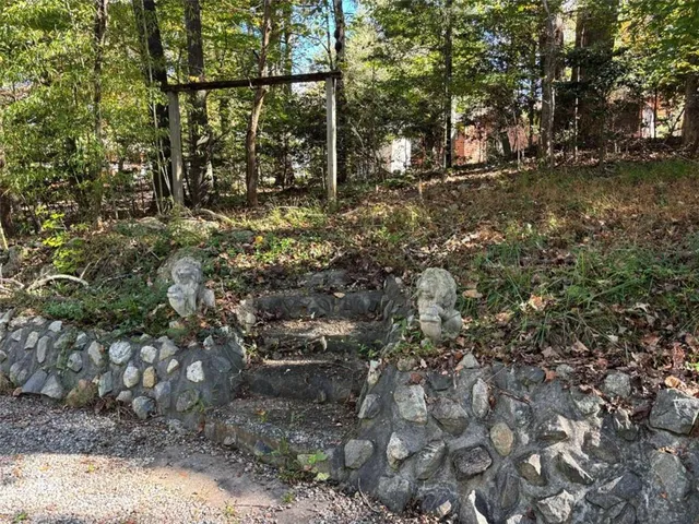 a house with trees in the background