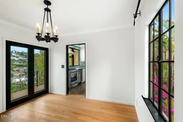 a view of entryway with wooden floor