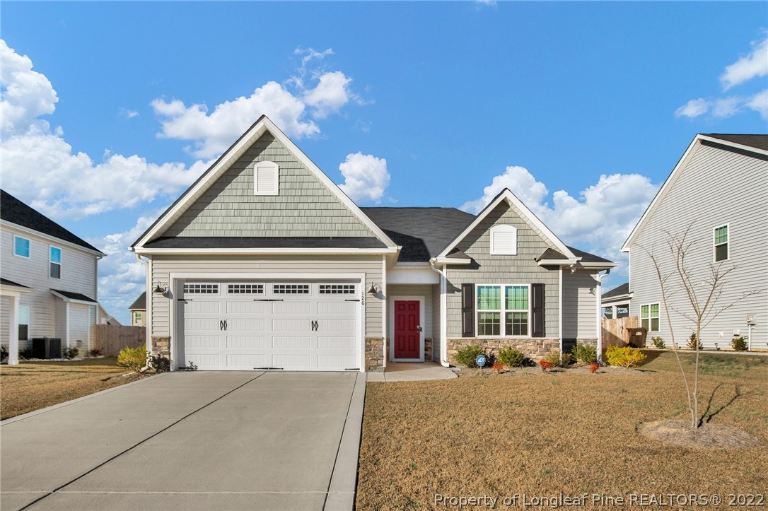 126 Verdmont Drive Raeford, NC 28376 - Photo 1 of 30 a view of a house with a yard