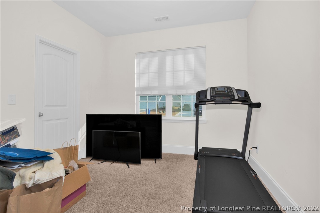126 Verdmont Drive Raeford, NC 28376 - Photo 20 of 30 a view of room with furniture and window