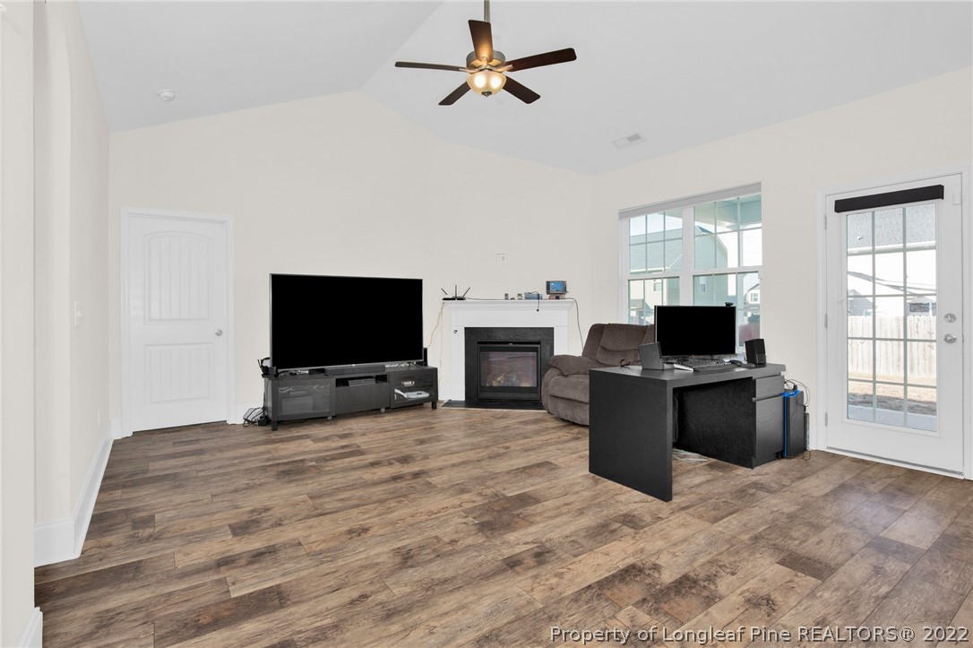 126 Verdmont Drive Raeford, NC 28376 - Photo 9 of 30 a living room with furniture and a flat screen tv