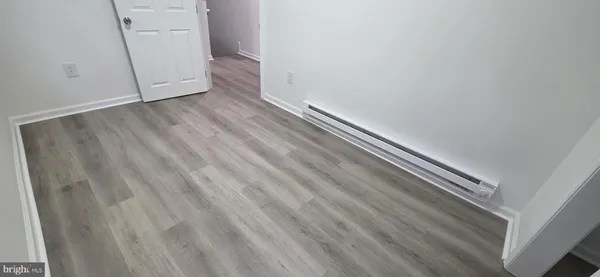 a view of a room that has a window