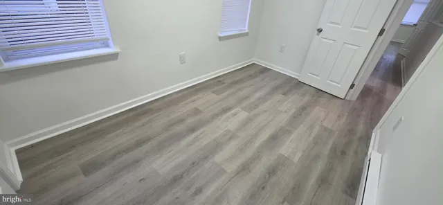 a bathroom with a toilet a sink and bathtub