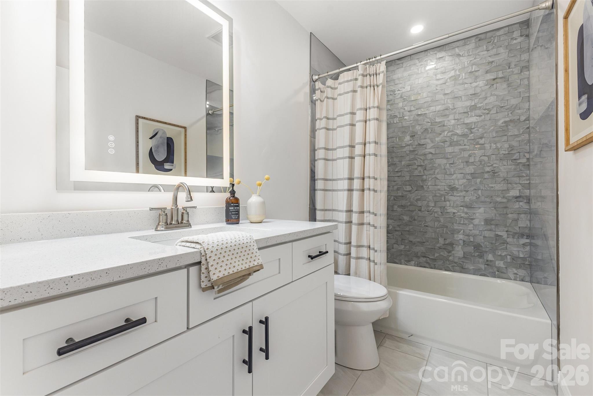 1184 Molokai Drive Fort Mill, SC 29708 - Photo 20 of 35 a bathroom with a sink a toilet and shower
