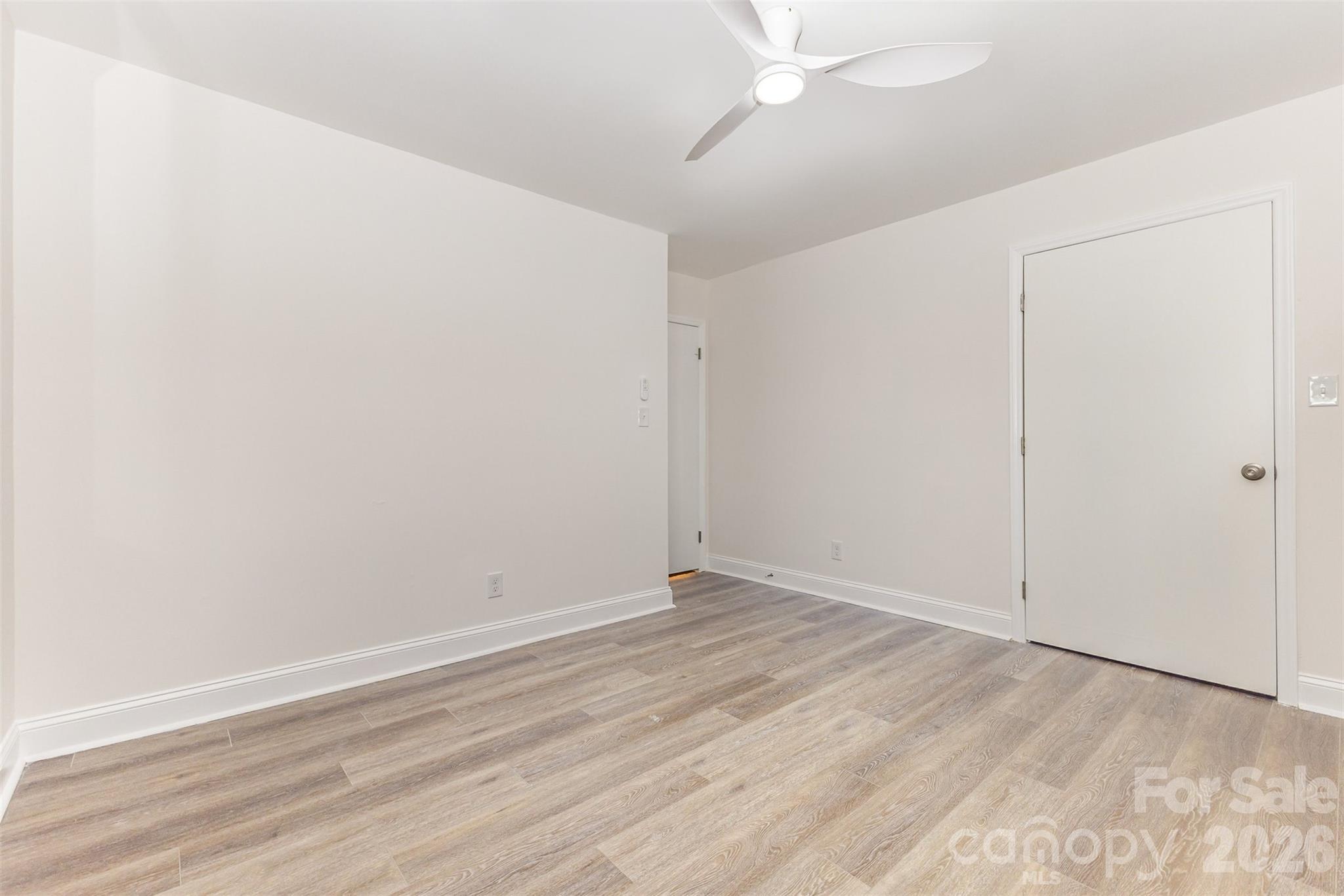 1184 Molokai Drive Fort Mill, SC 29708 - Photo 22 of 35 an empty room with an entryway and fan