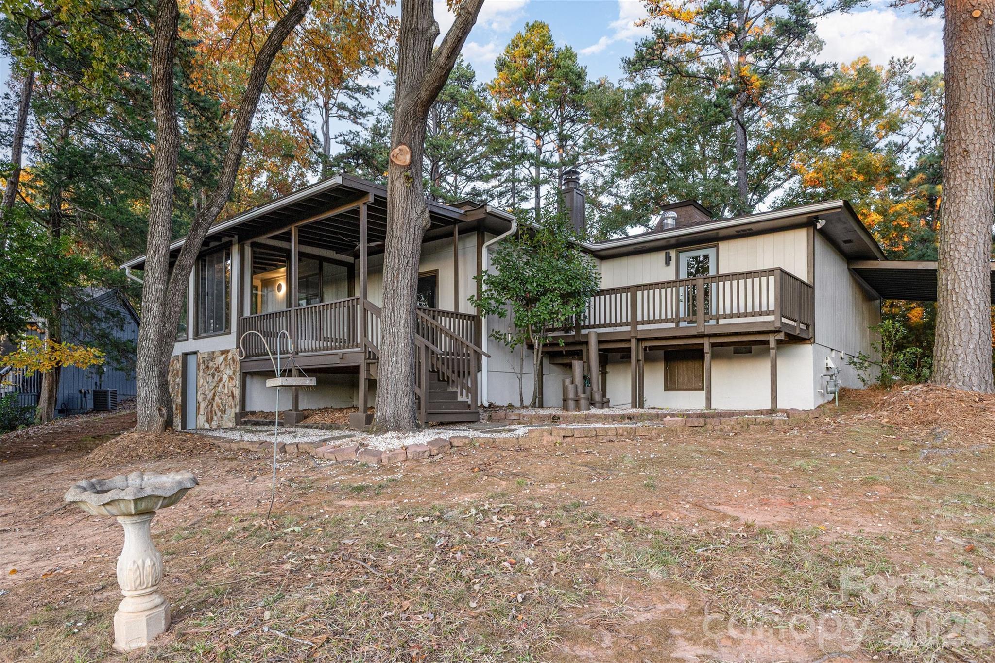 1184 Molokai Drive Fort Mill, SC 29708 - Photo 25 of 35 a view of a house with a large tree and a large tree