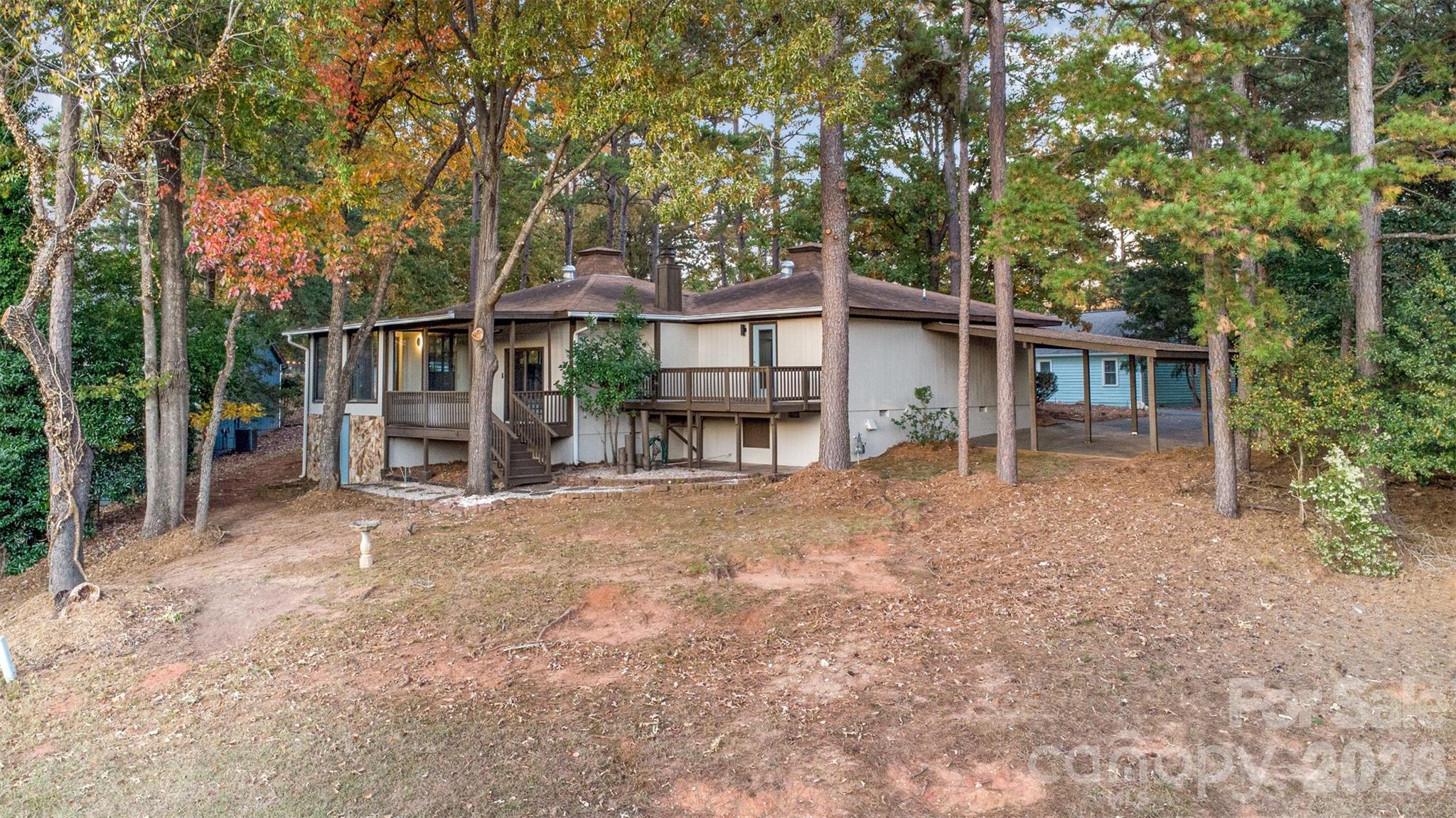 1184 Molokai Drive Fort Mill, SC 29708 - Photo 31 of 35 a view of a house with backyard and a tree