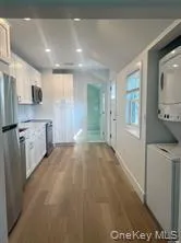 a view of a kitchen with a sink