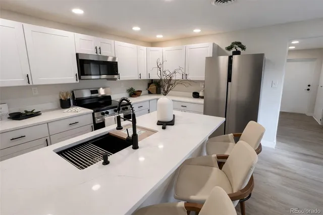 $594,000 | 7785 Westview Drive, Lakewood, CO 80214