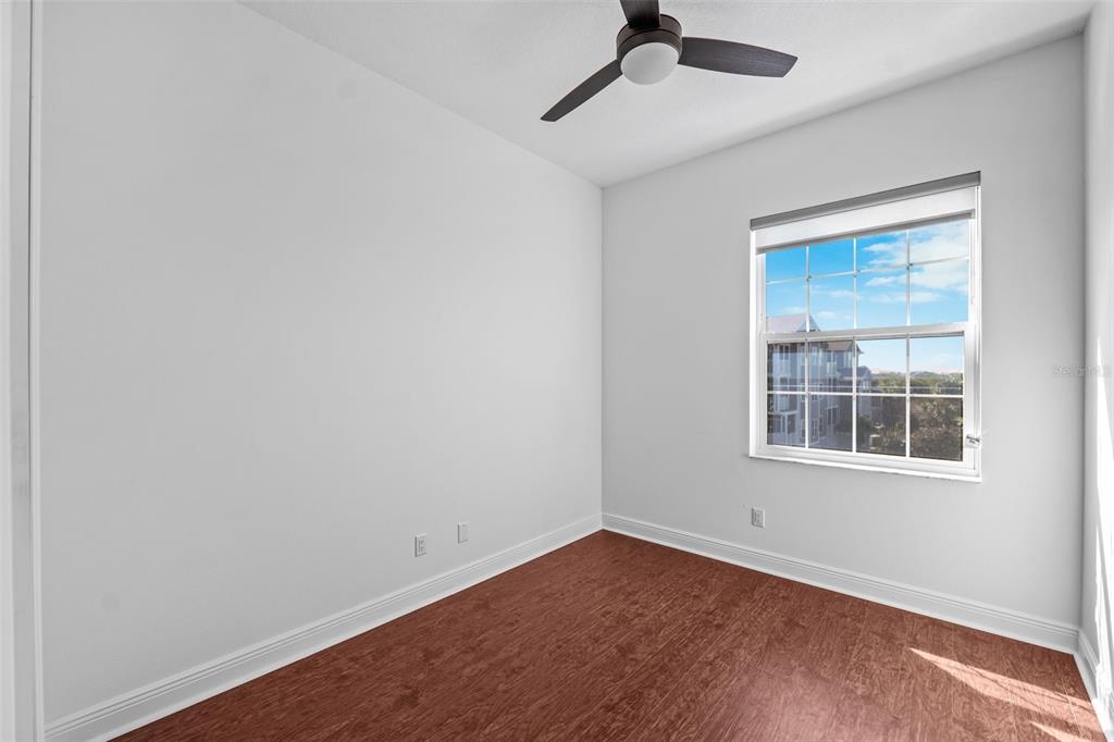 5730 Biscayne Court, Unit 6 New Port Richey, FL 34652 - Photo 17 of 55 an empty room with a window